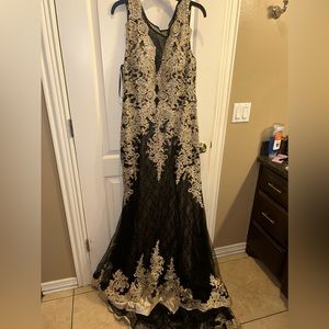 Long formal dress perfect for any occasion, back has a small train.